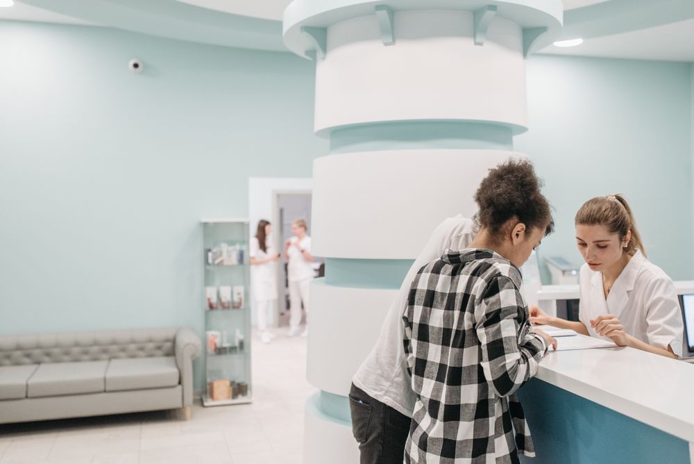 Patients and staff at a MedLifeMonitor reception area