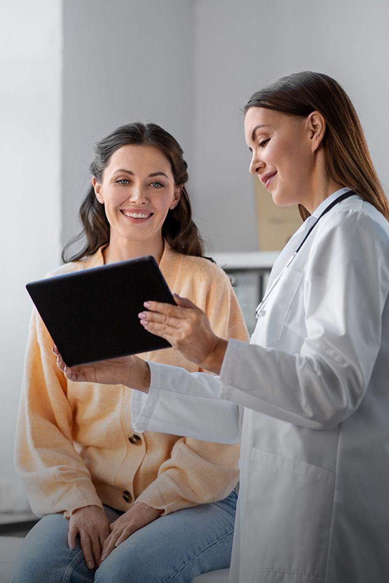 Physician in a consultation reviewing a patient's preventive health results